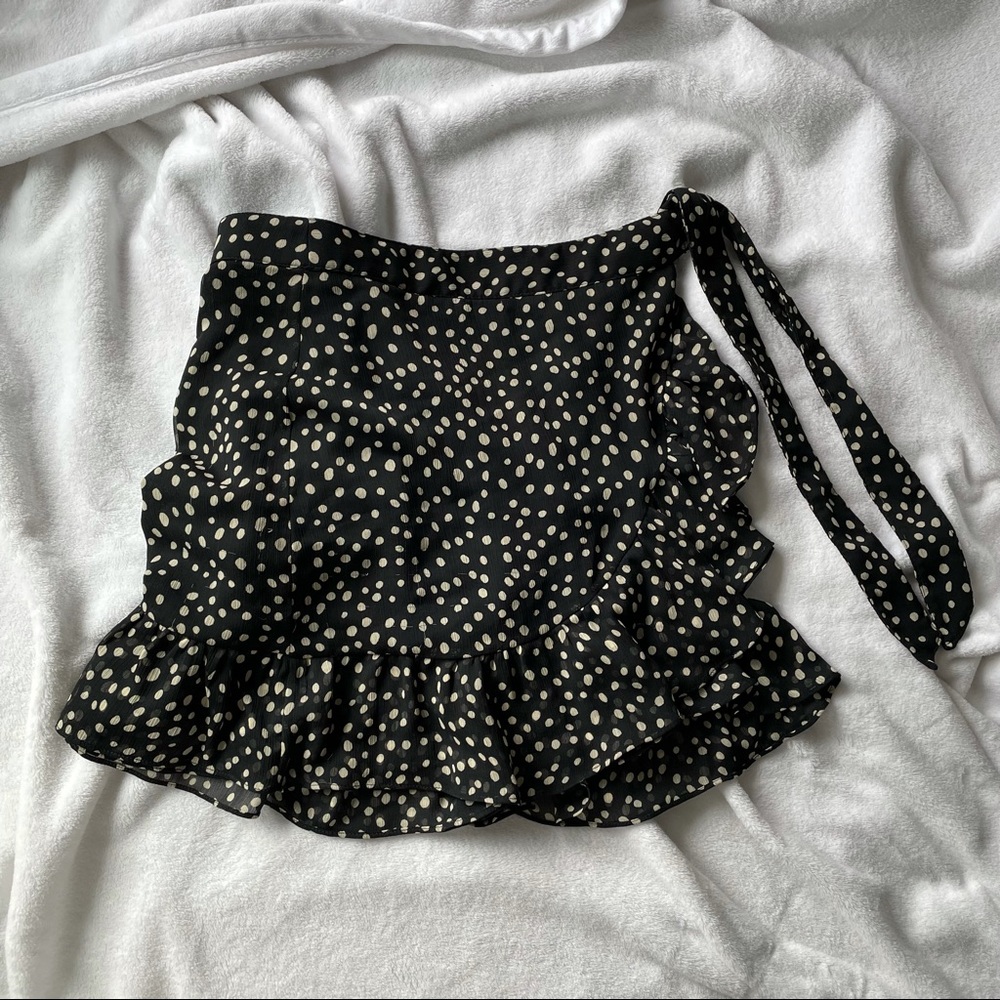 NWOT uo mini cross over skirt